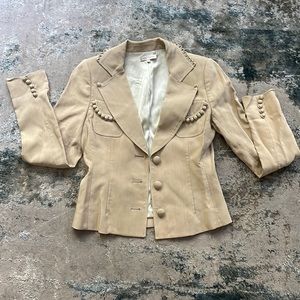 Like new condition with one button missing on the top. Easy fix for style!